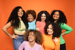© VICTOR TORRES/Stocksy - Portrait of young women with diverse afro hairstyles