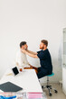 © Studio Firma/Stocksy - Doctor Examining Young Man