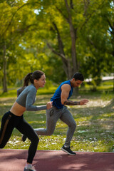 Sticker - Young couple jogging together in nature