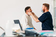 © Studio Firma/Stocksy - Doctor Examining Senior Man