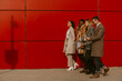 © qunica.com - Beautiful businesspeople having fun outside after work