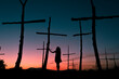 © Ibai Acevedo/Stocksy - Woman silhouette feeling pain for dying nature
