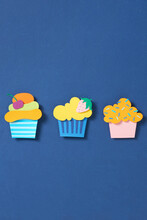 Set Cupcake Paper Cut On Blue Background
