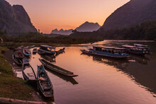 Sunset View Of Boats At Nam Ou River In Muang Ngoi Neua Village, Laos