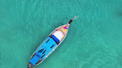 Wall Mural - Tourist relaxing on luxury longtail boat, Phi phi island, Thailand.