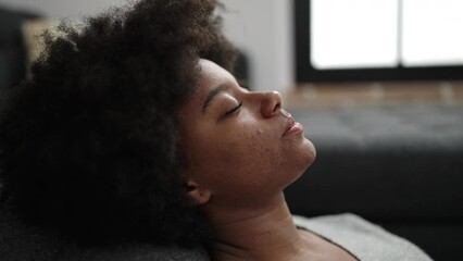 Sticker - African american woman relaxed on sofa at home