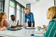 © Lumos sp - young business people meeting office teamwork group whiteboard presentation seminar man businessman startup project idea