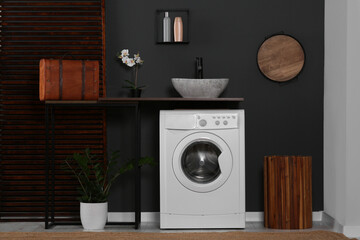 Wall Mural - Stylish laundry room with washing machine. Interior design