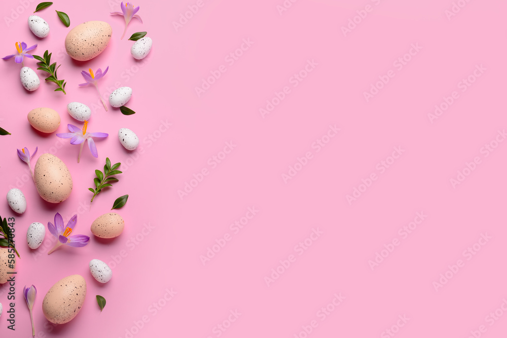 Composition with Easter eggs, beautiful crocus flowers and plant leaves on pink background
