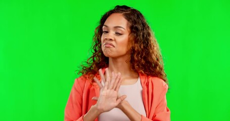 Wall Mural - Stop, no and hand gesture with a woman on a green screen background in studio feeling negative. Portrait, angry and reject with a female on chromakey mockup to express her opinion in protest