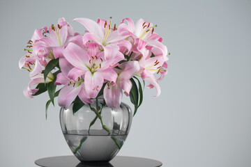 Wall Mural - Beautiful lily flowers bouquet in a glass vase. Lillies. Pink lilies design. Big bunch of fresh fragrant lilies purple background. 