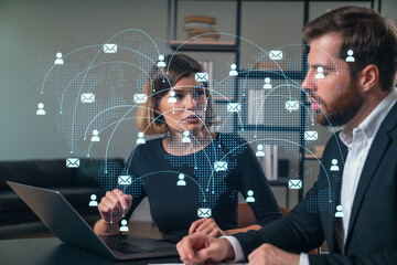 Wall Mural - thoughtful businesspeople typing on laptop at office workplace. concept of team work, business educa