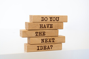 Poster - Wooden blocks with words 'Do You Have the Next Idea?'.