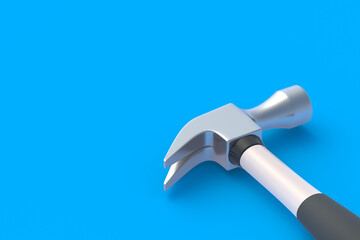 Wall Mural - Hammer on blue background. Construction concept. Home renovation. Tools for repair. Copy space. 3d render