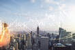 © Pixels Hunter - Multi exposure of virtual creative financial chart hologram on New York skyscrapers background, research and analytics concept