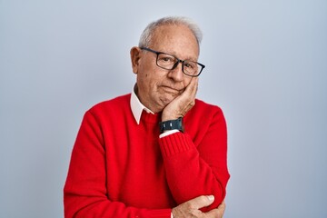 Poster - Senior man with grey hair standing over isolated background thinking looking tired and bored with depression problems with crossed arms.