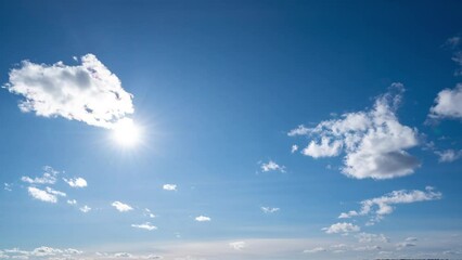 Wall Mural - blue sky white clouds. puffy fluffy white clouds. cumulus cloud cloudscape timelapse. summer blue sk