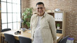 © Krakenimages.com - Young hispanic man business worker standing at office