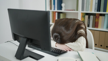 Sticker - Young beautiful hispanic woman student using computer stressed at library university