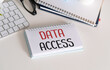 © Inna - Data Access - text on a notepad and keyboard. Concept of pass or permission to access data.