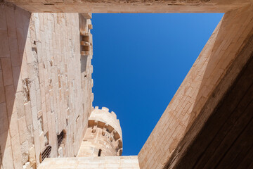 Wall Mural - Stone walls and Tower of the Citadel of Qaitbay. Alexandria, Egypt