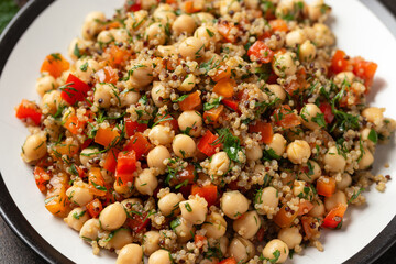Wall Mural - Chickpea Salad with Quinoa, sweet red pepper, herbs and lemon. Healthy food