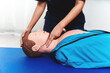Emergency CPR Training on dummy , take the pulse on unconscious person, One part of the process resuscitation.