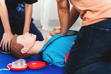 Wall Mural - CPR Training ,Emergency and first aid class on cpr doll, Cardiopulmonary resuscitation, One part of the process resuscitation on unconscious person.