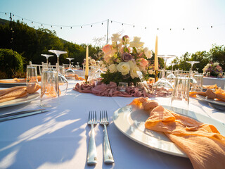 Wall Mural - Table at luxury wedding reception event. Beautiful flowers on table and serving dishes and glasses and decoration