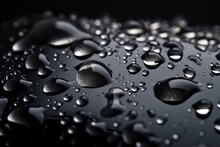  A Close Up Of Water Droplets On A Black Surface With A Black Background And A White Spot In The Middle Of The Picture To The Right Of The Image.  Generative Ai