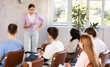 © JackF - While working in classroom, teacher answers questions that students had while studying new lesson