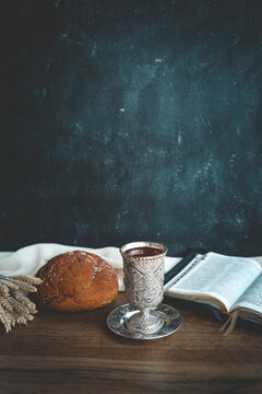 wine, bread and open bible, communion concept