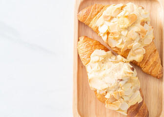 Wall Mural - croissant with cream and almonds