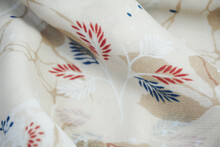 Wavy And Folded Fabric Patterned With Leaves