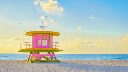 Wall Mural - Lifeguard hut on the beach in Miami Florida, colorful hut on the beach during sunrise Miami South Beach. Sunny day on the beach