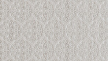 Elegant Light Ornate Pattern Wallpaper. White 3D Stucco Background.