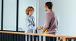 © Jacob Lund - Hiring manager shaking hands with a job candidate in an office