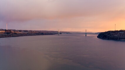 Wall Mural - Aerial view of the Tacoma Narrows Bridge over the Puget Sound at sunset 