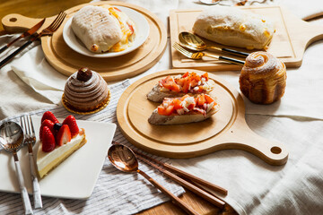 Poster - Various desserts, breads and cakes on the table	