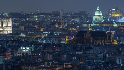 Canvas Print - Paris night cityscape timelapse seen from Montmartre with Notre Dame de Paris and Pantheon dome. Top aerial view from viewpoint. Paris, France