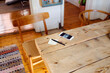 © Astrakan Images - Smart phone and sticky note on wooden table