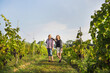 © Astrakan Images - Portrait of mother with daughter in vineyard