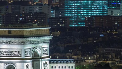 Sticker - Aerial night timelapse view of Paris City and Triumphal Arch shot on the top of Eiffel Tower observation deck. Evening illumination from above