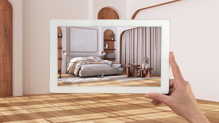 Wall Mural - augmented reality concept. hand holding tablet with ar application used to simulate furniture and de