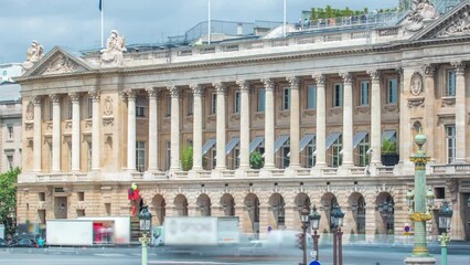 Wall Mural - Architecture of Place de la Concorde timelapse in Paris. Repearing works on a facade. Traffic on a road. Cloudy sky at summer day. Paris, France.