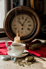 Wall Mural - burning candle, a symbol of the moon, an amulet lying on a red natural background. pagan wiccan, slavic traditions. Witchcraft, esoteric spiritual ritual. autumn equinox festival