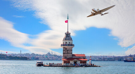 Wall Mural - Vintage type old metallic propeller airplane in the sky - Istanbul Maiden Tower (kiz kulesi) with bright cloudy sky - Istanbul, Turkey 