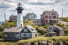 Lighthouse And Its Accompanying Buildings, Nestled In A Quaint Coastal Village 