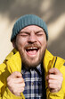 © Barillo_Images - Candid positive emotions of adult bearded man.