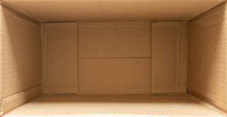 Wall Mural - Open empty brown cardboard box background top view